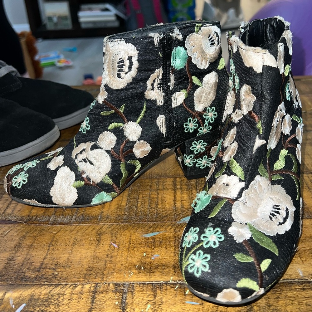 Stitched flower heeled boots